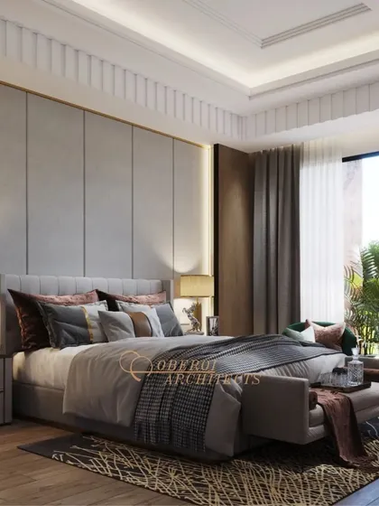 Elegance meets comfort in this luxurious bedroom. The design uses a sophisticated color palette and a mix of textures to create a serene escape.