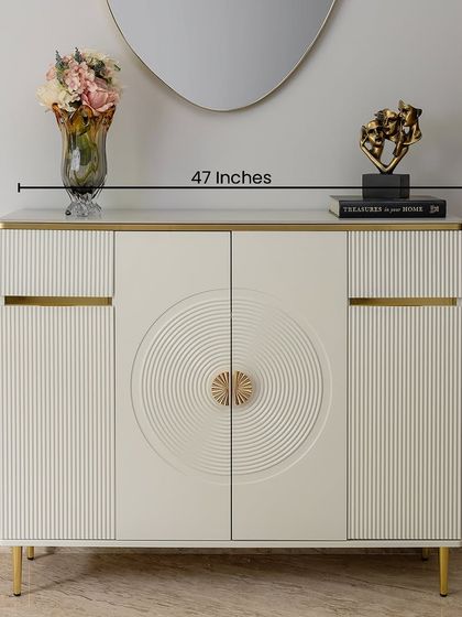 Here you can see the dimensions of our cream-toned cabinet. At 47 inches wide and 39 inches tall, it provides substantial storage while maintaining an elegant profile.