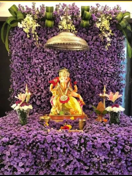 A close-up of the stunning all-purple fresh flower mandap. The sheer density and vibrancy of the purple blooms create a powerful and immersive experience.