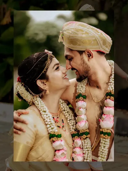 An intimate, close-up shot of the couple, their faces close together, sharing a smile that speaks volumes about their connection.