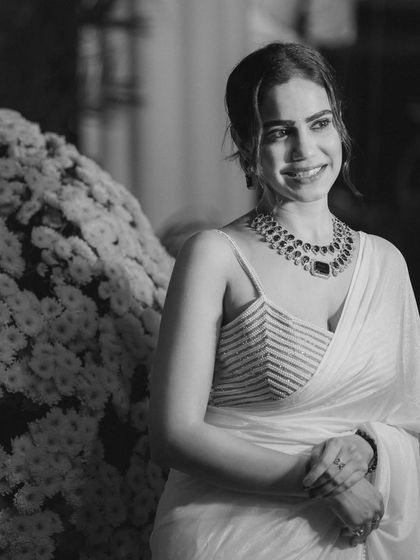 A classic black and white portrait that adds a timeless feel to the shoot at Radisson Blu, Goa.