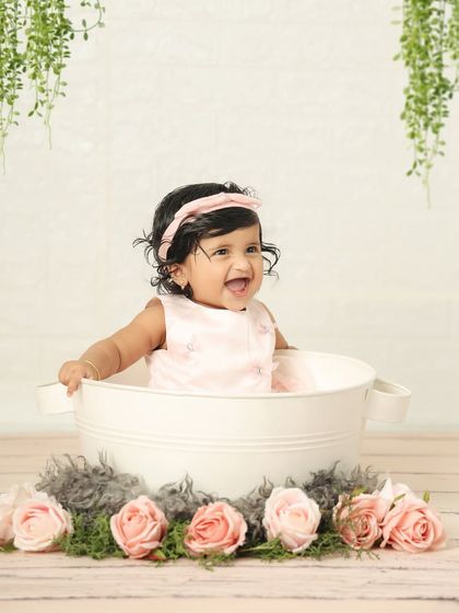 Pure bliss! This happy girl's smile is so infectious. Tub setups like this are always a hit and lead to such joyful photos.