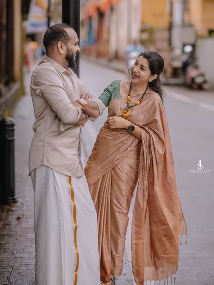 A candid conversation on a wet street. I love capturing these real moments that happen between poses.