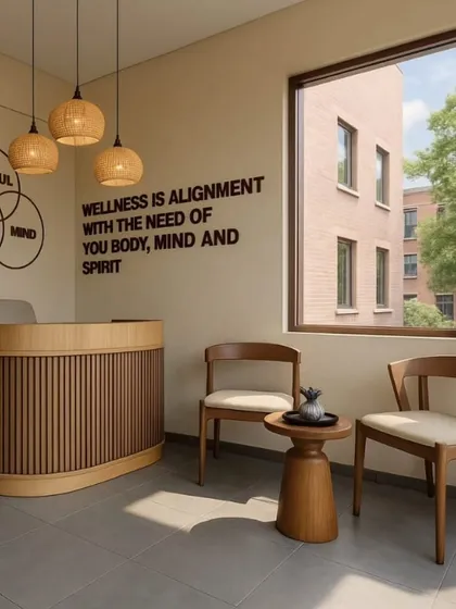 Natural light and clear messaging are key in a wellness reception. We designed this space with a large window and a simple, powerful quote on the wall to create an open, honest, and calming first impression.