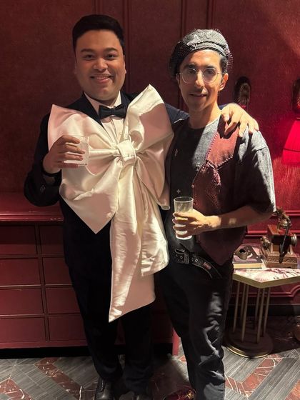 We love styling clients with unique personalities. This look, featuring a vintage-style vest and beret, was curated for a client's night out and perfectly matched his creative flair. The giant bow was just for fun!