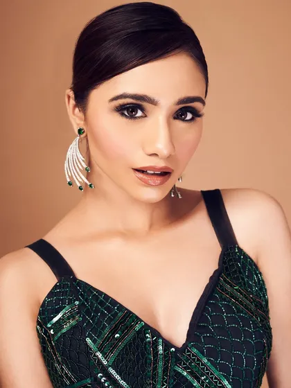 Love me a pop of color! This emerald eye look is for the client who isn't afraid to be bold. I balanced the dramatic, jewel-toned smokey eye with a clean base and a neutral lip to keep it chic and sophisticated.