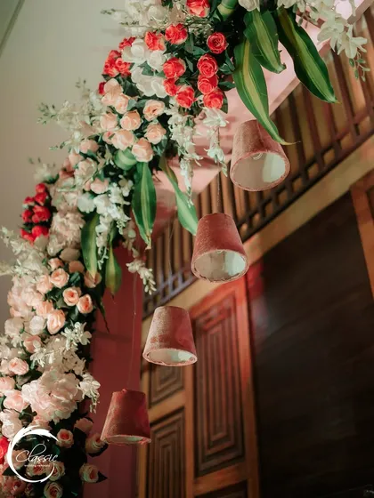 It's the small details that matter. I incorporated these small, hanging terracotta lamps into the floral arch to add a touch of traditional craftsmanship to the design.