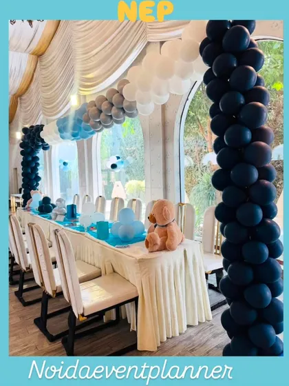 We decorate the entire space, including guest tables, with themed elements and balloon columns to ensure a consistent and immersive experience.