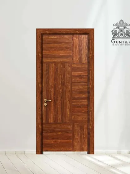 This laminated door shows how a geometric pattern can be created with different grains of wood. It's a modern and artistic approach to door design.