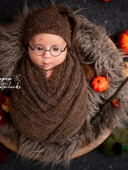 An overhead view of our Harry Potter setup, showcasing the rich, autumnal colors and magical props like pumpkins and a wizard's wand that complete the scene.
