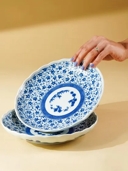 A collection of our product photography for various home decor and tableware brands. These shots display a range of items including placemats, table runners, ceramic bowls, plates, vases, bar tools, and candles, all styled to perfection.