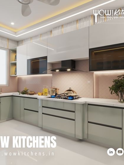 Another view of the sage green and pink kitchen, highlighting the clean lines and the beautiful combination of colors and textures.