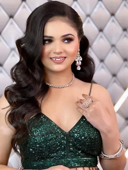 A complete party look featuring classic Hollywood waves. This style adds so much glamour and works beautifully with this sparkling green gown, making it ideal for a cocktail party or reception.