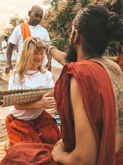 A student receives a blessing during a ceremony. These rituals are not just symbolic; they are powerful experiences that can create deep shifts in our consciousness, connecting us to a lineage of masters.