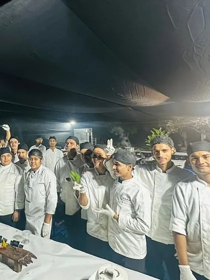 Our passionate culinary team at the end of a successful event. We are a group of dedicated, detail-obsessed chefs and service staff who work tirelessly behind the scenes to ensure every event is flawless.