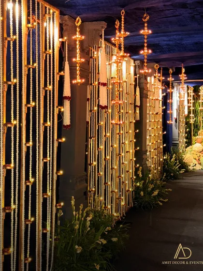 The pathway to the divine, where every step is lit by the soft glow of hundreds of diyas.