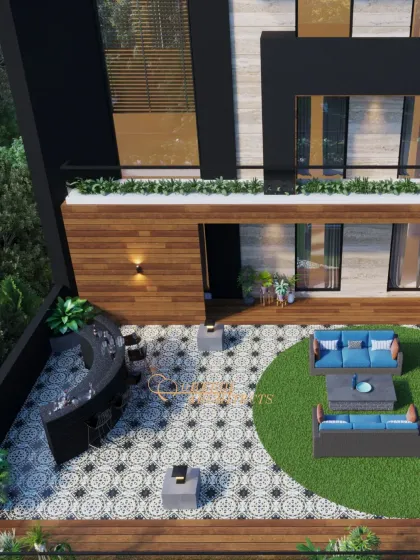 An elevated outdoor space designed for classy evenings under the stars. This aerial view shows a curved bar, a lounge area on an artificial lawn, and beautiful patterned tiles.
