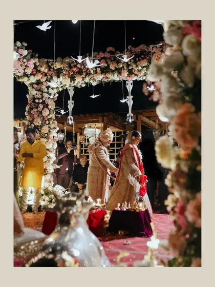 A collage of moments from a grand wedding ceremony, showing the pheras under a stunning floral mandap.