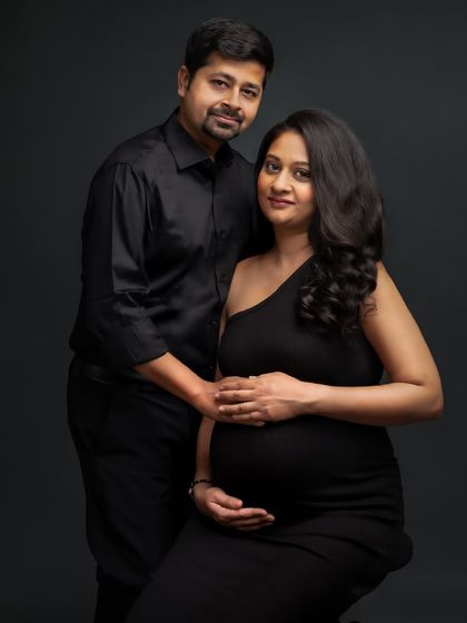A classic and formal couple's portrait in all black. This look is sophisticated, timeless, and puts all the focus on your connection.