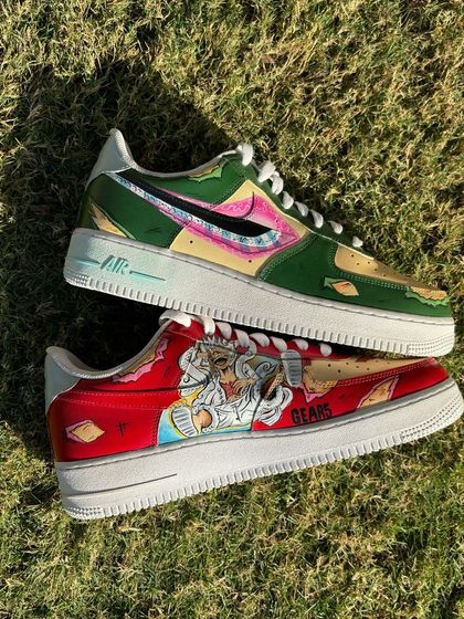 Close-up on the Luffy Gear 5 custom sneaker, showcasing the detailed artwork and vibrant red color palette.