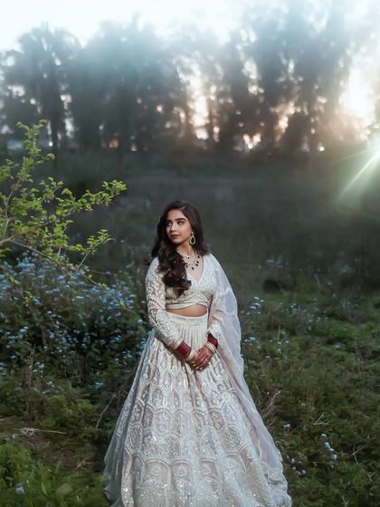 A dreamy, fairytale-like portrait of my reception bride. The soft, glowing makeup looks ethereal in the misty outdoor setting.