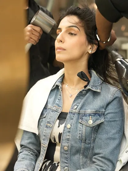 The art of the blowout. Our stylists use expert techniques to create volume and shine, ensuring you leave with hair that looks and feels amazing.