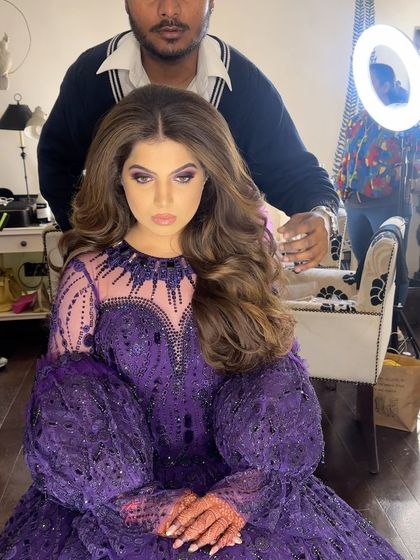 Behind the scenes of creating soft, voluminous curls for a radiant bride in Jaipur.