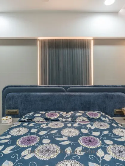 This master bedroom features a sleek TV unit with a hidden study table seamlessly built into the design. It's a perfect harmony of luxury and smart functionality.