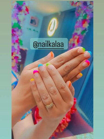 Fun and colorful French tips for a playful vibe. Each nail features a different neon color, making it a perfect choice for summer, holidays, or just to brighten your day.
