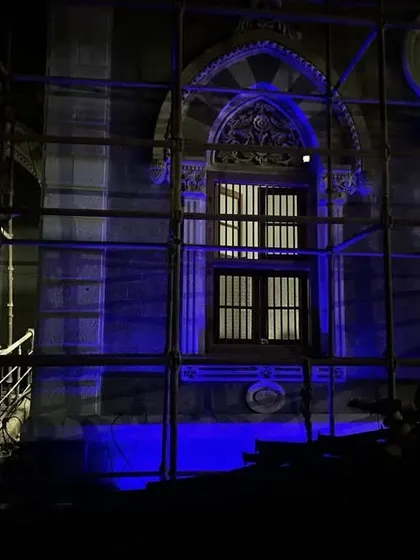 A test of the dynamic color capabilities. The powerful blue light demonstrates how the building's mood can be completely transformed for festivals and public events, adding a modern, vibrant dimension to the historic structure.