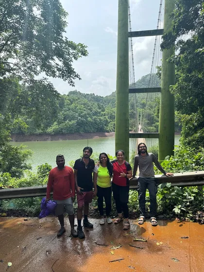 Posing on a hanging bridge over a river in the Sharavathi valley. These bridges are an adventure in themselves and offer stunning views.