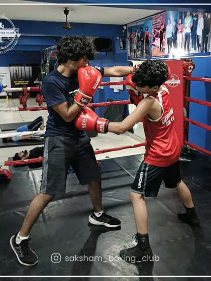 Proper technique is everything. Here, two of my students practice their form in the ring, focusing on landing clean punches and maintaining a strong defensive stance.