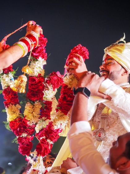 The fun and excitement of the Jaimala (garland exchange) ceremony, a highlight of many Indian weddings.