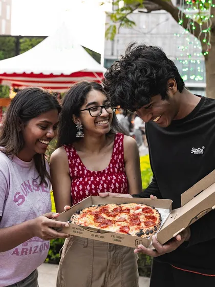 Sharing is caring, especially when it's a fresh Brik Oven pizza. Our catering service is all about bringing people together over great food.