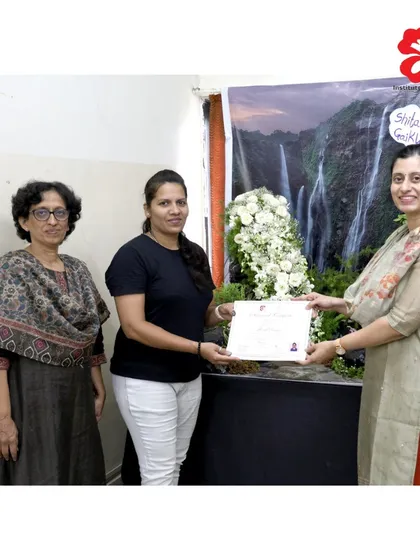 A student from our Pune branch receives her graduation certificate from the instructor. We take pride in celebrating the accomplishments of each and every one of our students.