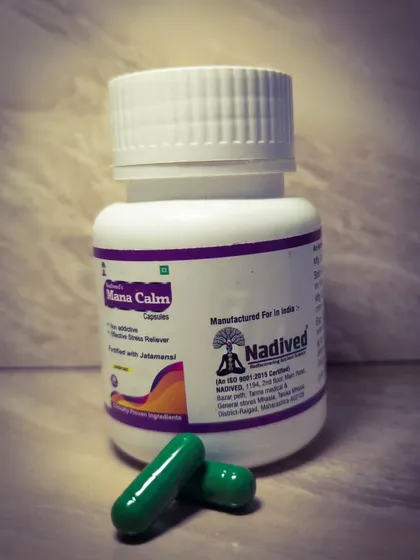 These are my Mana Calm capsules, formulated to provide effective stress relief. I use clinically proven ingredients like Jatamansi to calm the nervous system, help with sleep, and act as a natural mood stabilizer.