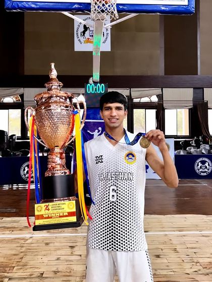 Another champion from the Rajasthan team at the Junior Nationals. The smile of a winner who knows he left it all on the court.