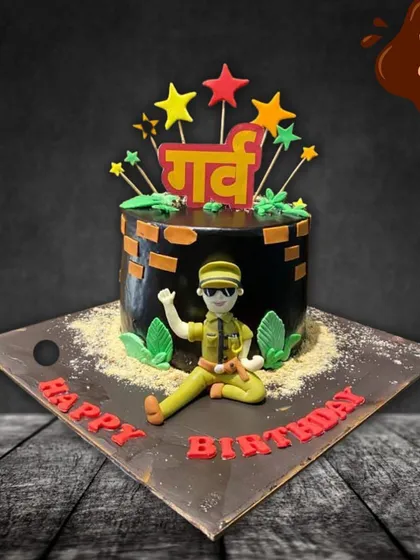 A proud cake for a police officer's birthday. This design features a fondant policeman in uniform, with the word "Garv" (Pride) written in Hindi, celebrating his service and dedication.