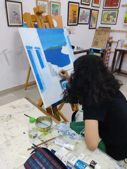 A series of images showing the progression of an acrylic seascape painting, from the initial blocking of colors to the addition of fine details.