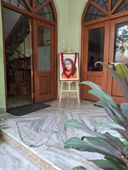 The entrance to our satsang, where a portrait of our guru, Paramhansa Yogananda, welcomes all who enter. His presence is the foundation of our gatherings, guiding and inspiring us on our spiritual path.