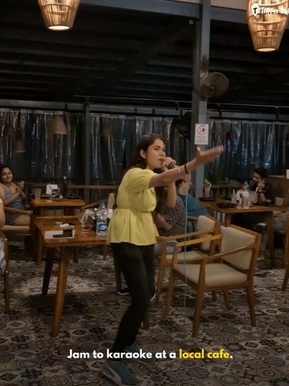 Jamming to karaoke at a local cafe in Gokarna. Our trips are filled with fun, spontaneous activities that bring the group together and create a lively, unforgettable atmosphere.