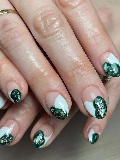 A unique design with a white base and abstract green and gold foil details, resembling a beautiful gemstone.