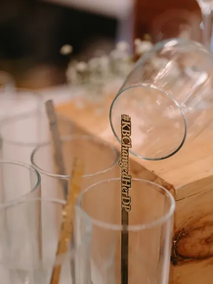 It's the little things that count. We provide custom stirrers engraved with the couple's wedding hashtag, like this one for #KBChangedHerDP, making every drink a part of the celebration.