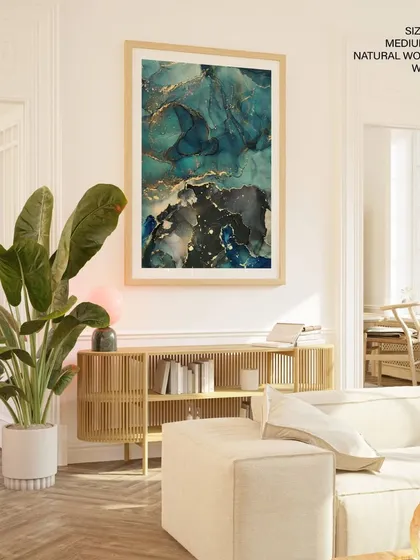 Make a bold statement with this sea green and gold fluid ink abstract painting. The dynamic swirls of color, protected by a glass finish and a natural wood frame, bring a luxurious and contemporary energy to any room.