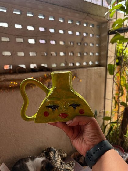 I just love this quirky, expressive face vase made by a beginner student. It’s so full of personality and charm. This is what happens when you let go of perfection and just have fun with the clay.