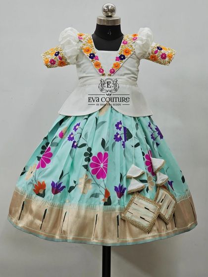 Another view of the white and blue floral lehenga set.