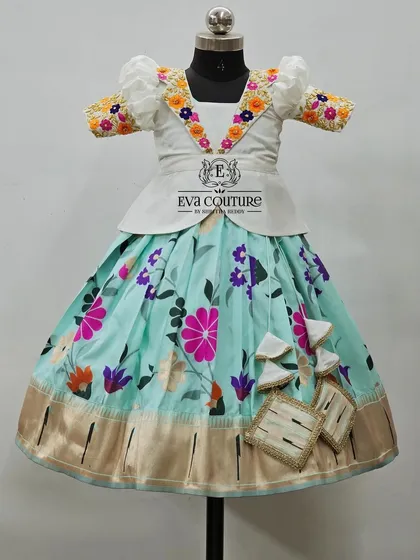 Another view of the white and blue floral lehenga set.
