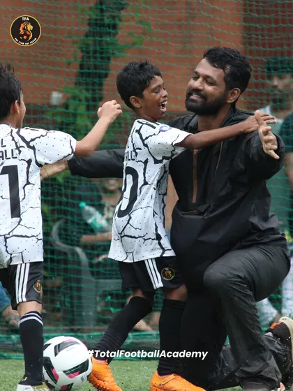 More than just a team, we are a family. This moment between a player and his coach after a game captures the joy, trust, and strong bonds we build on and off the pitch.