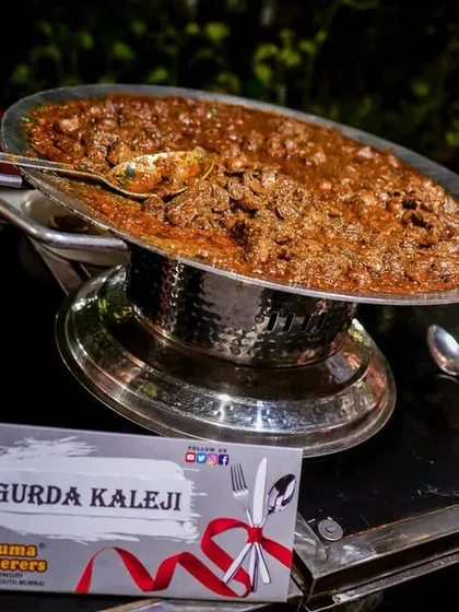 Gurda Kaleji served in a traditional silver dish, showcasing our expertise in classic Mughlai and Memon preparations.