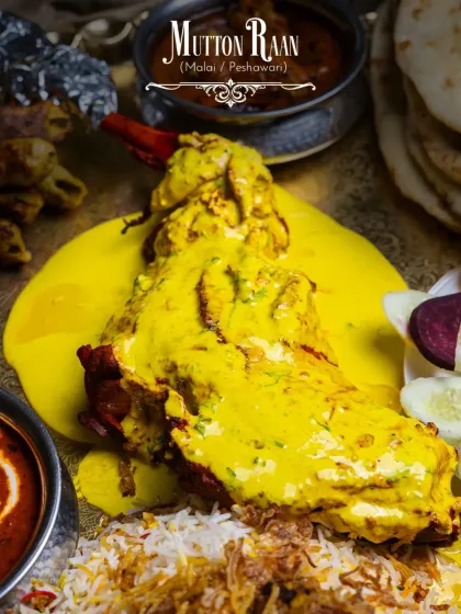 Behold the Mutton Raan, prepared in two of my most beloved styles: Malai and Peshawari. Drenched in a rich, velvety yellow sauce, this dish is a true royal indulgence. The meat is so tender it falls off the bone, making every bite a creamy, flavourful experience fit for kings and queens.